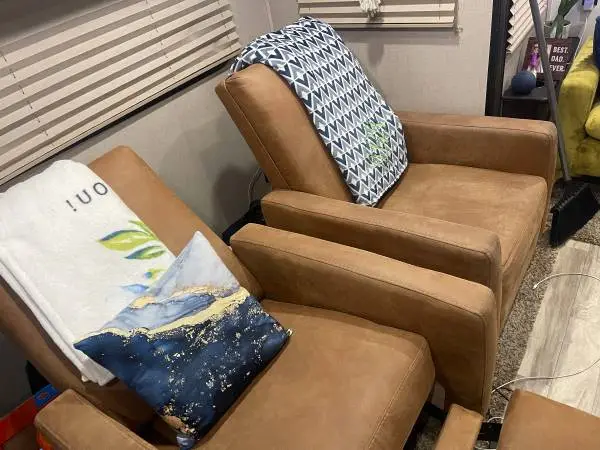 2 gently used RV sized recliners leather suede finish