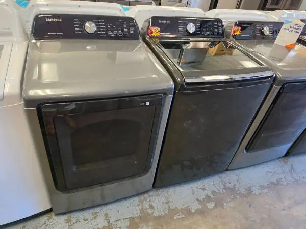 Samsung black top loading smart washer and gas dryer