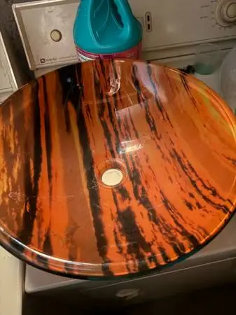 Glass vessel bathroom sink