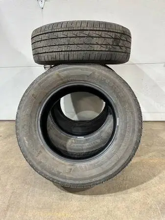 set of 4 *P235-65-17 Firestone used tires