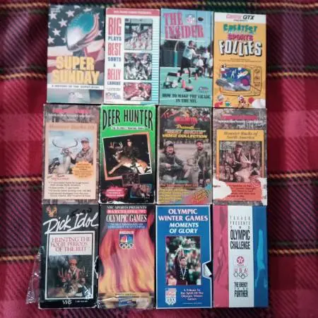 12 Sports VHS Tapes Football, Deer Hunting, Olympics + More
