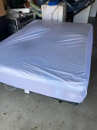 Queen-size tempurpedic bed with adjustable base and lighting