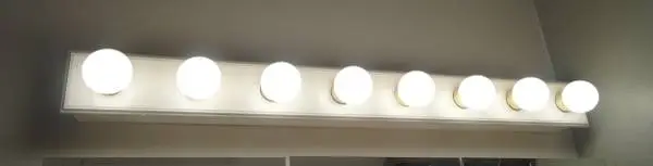 8 light bath or Vanity light on white wood base