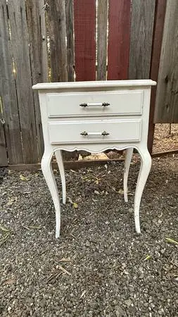 Metal Cabinet’s, wood end table, wood shutters, glass door