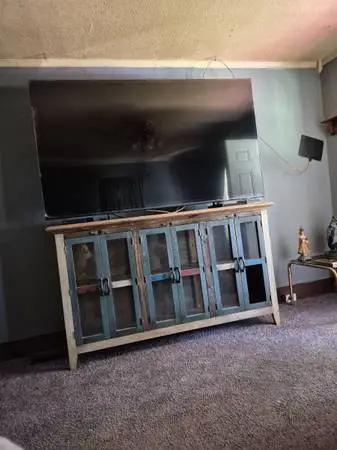 New 85 inch Samsung smart TV and entertainment center