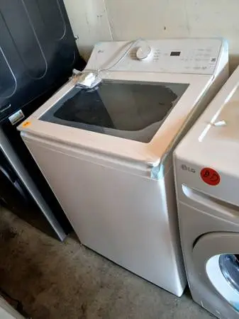 New white top load washer lg