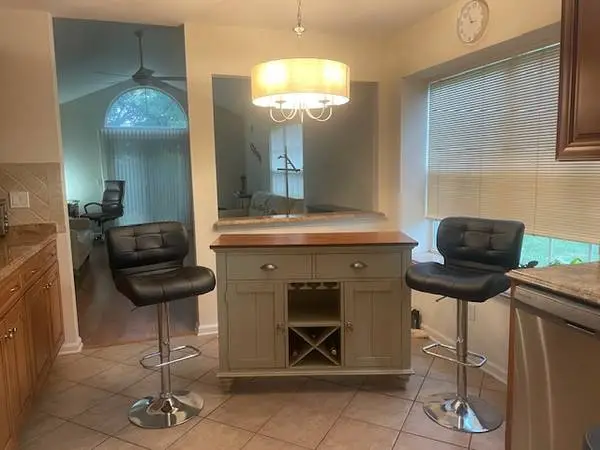 2 LIKE NEW ADJUSTABLE BAR STOOLS
