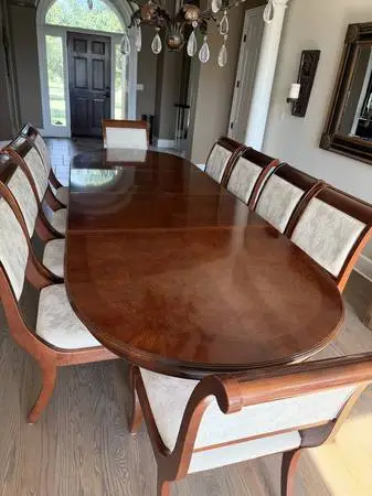 Dining room table with 10 chairs.