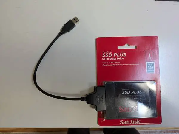 1TB Sandisk SSD drive, Plus USB adapter, Loaded with 898GB Music