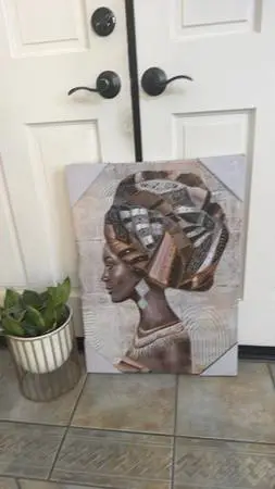 Canvas print featuring a side-profile portrait of a woman.