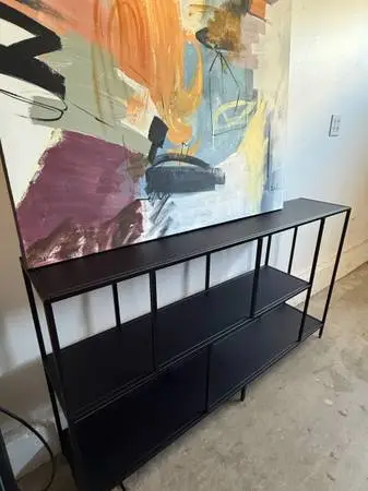 Black metal shelving unit