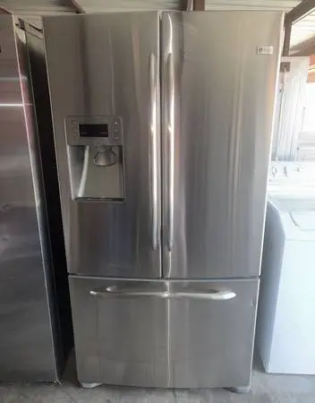GE Stainless Steel Refrigerator And Freezer