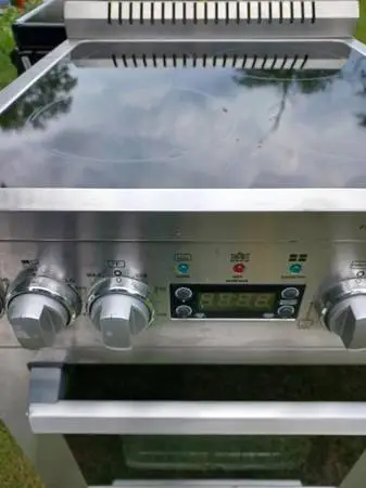 apartment size like new stainless electric stove  20( 1 year warranty