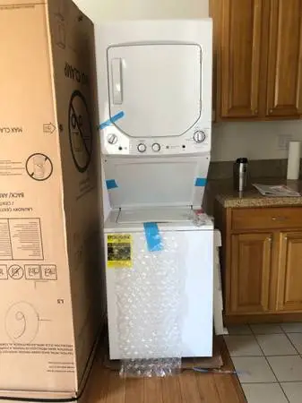 BEAUTIFUL BRAND NEW GE WASHER AND DRYER COMBO -