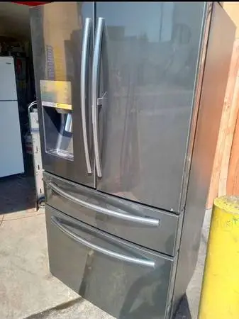 Samsung four doors black stainless steel 36  w