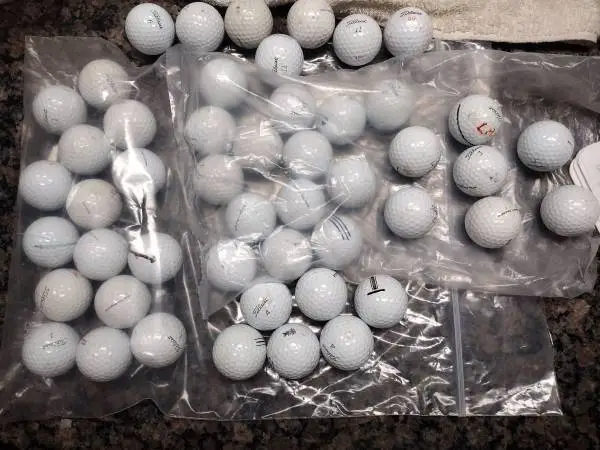 Lot of 50 Titleist golf balls varied numbers