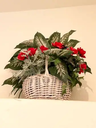 Decorative floral arrangement in baskets / classic dish garden.