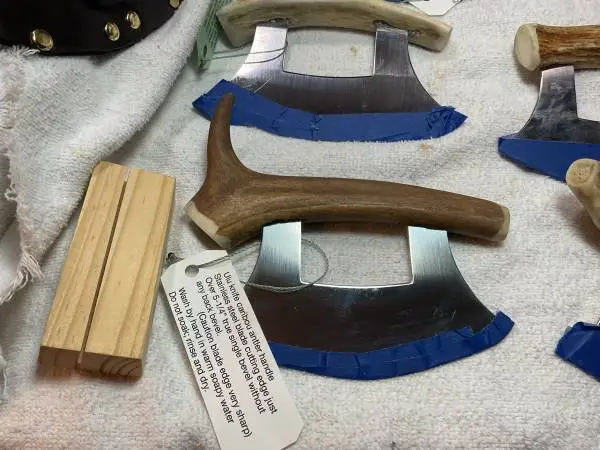 Ulu’s hand made here with stands all have Alaskan antler handles