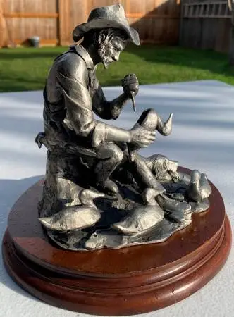 Pewter sculpture of a duck decoy maker by cvhill mark 414/500