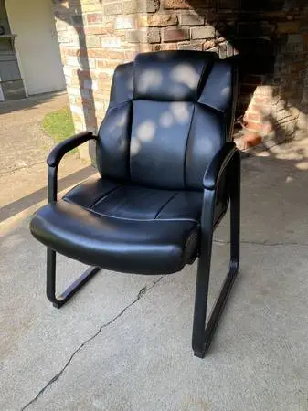 Black faux leather office chair