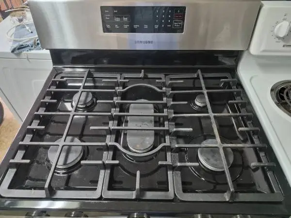 Gas Stove . Refurbished . $365 less with trade . Buy old appliances