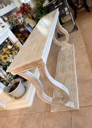 Hand - carved cream mango wood console table.