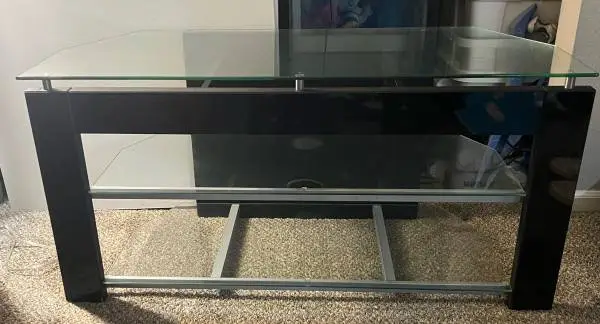 Black metal-and-glass console table