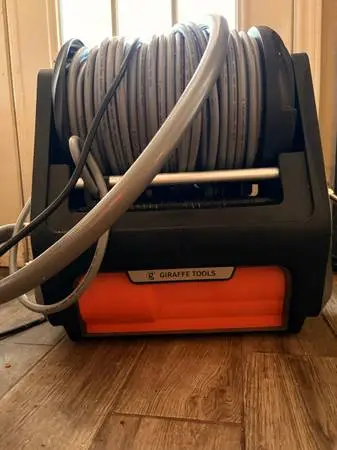 Wall mount power washer