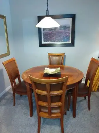 Dining  table and six matching chair ,moving must sell