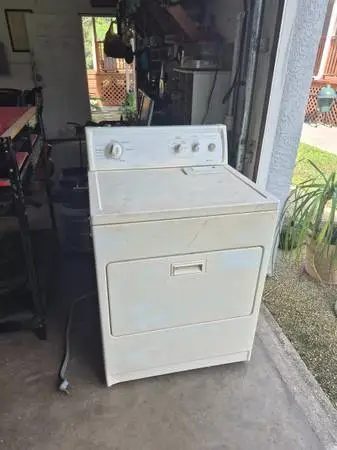 Used clothes dryer, plugged in and working fine