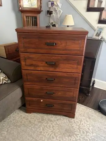 Wood Bed with drawers and Breuer.