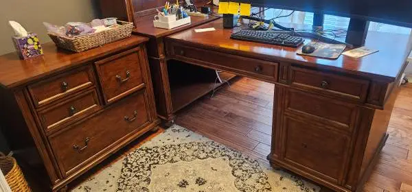 Office: Double sided desk, Desk, file cabinet, and hutch