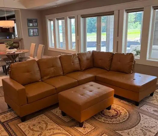 Carmel leather sectional couch and storage ottoman