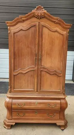 Tuscan style clothing armoire from Century furniture