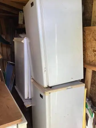 Three Hotel Size refrigerators