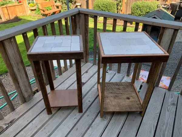A new pair stone top side tables