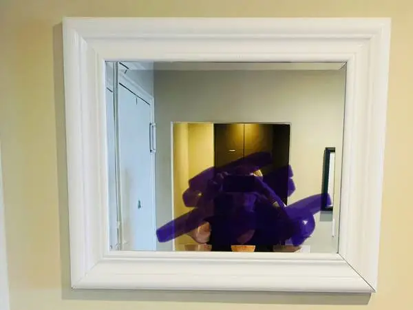 White glossy beveled mirror