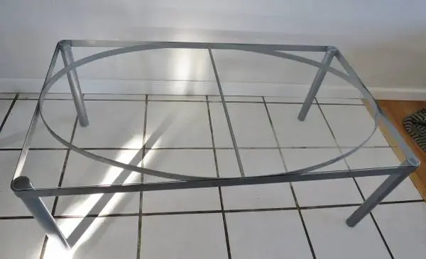 Nice Modern Glass and Silver Metal color Coffee Table Like New.