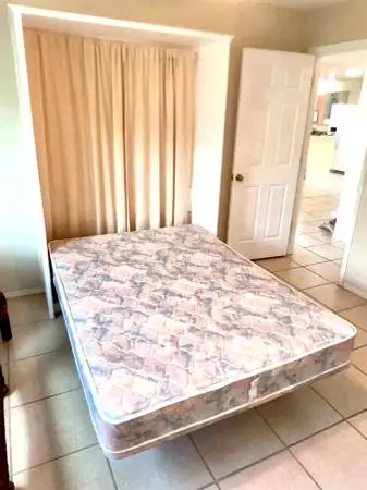 Full size Murphy bed with custom enclosure