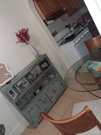 Couch, center table, rocking chair, beautiful dresser