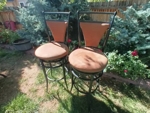 2 Large Bar Stools Swiveling 45.5 tall.  27 from floor to seat