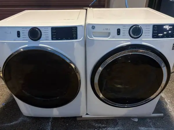 New ge front load 4.8 cu ft washer and matching 7.3 gas dryer