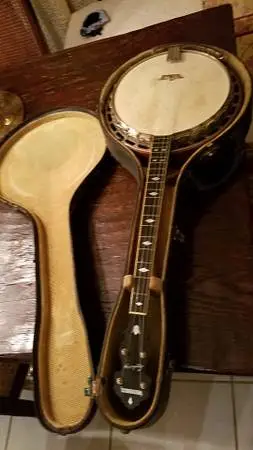 Musical instruments- banjo, antique sheet music, keyboard, stand and more