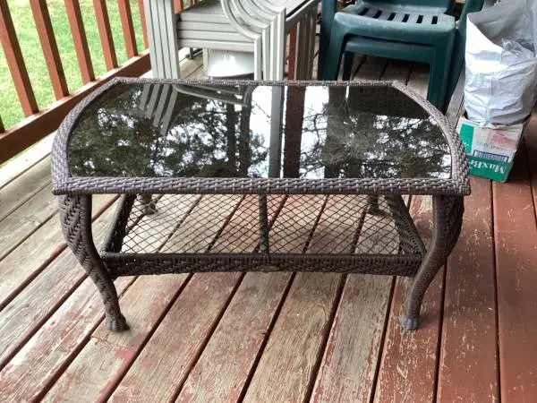 Wicker and glass coffee table