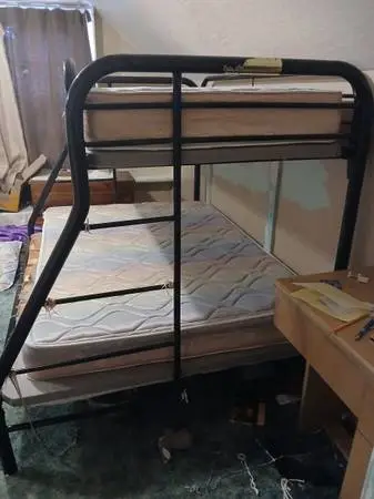 Metal bunk bed with mattresses