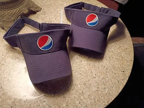 2 authentic Pepsi Visors
