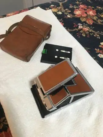 Vintage poloroid sx-70 with leather case working mint