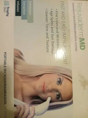 Hand Held Portable DermaSuction Pore Cleaning Device.