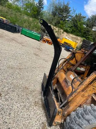 Skid steer tree boom