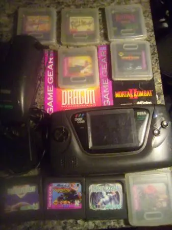 Sega game gear missing battery covers includes 9 games & power pack